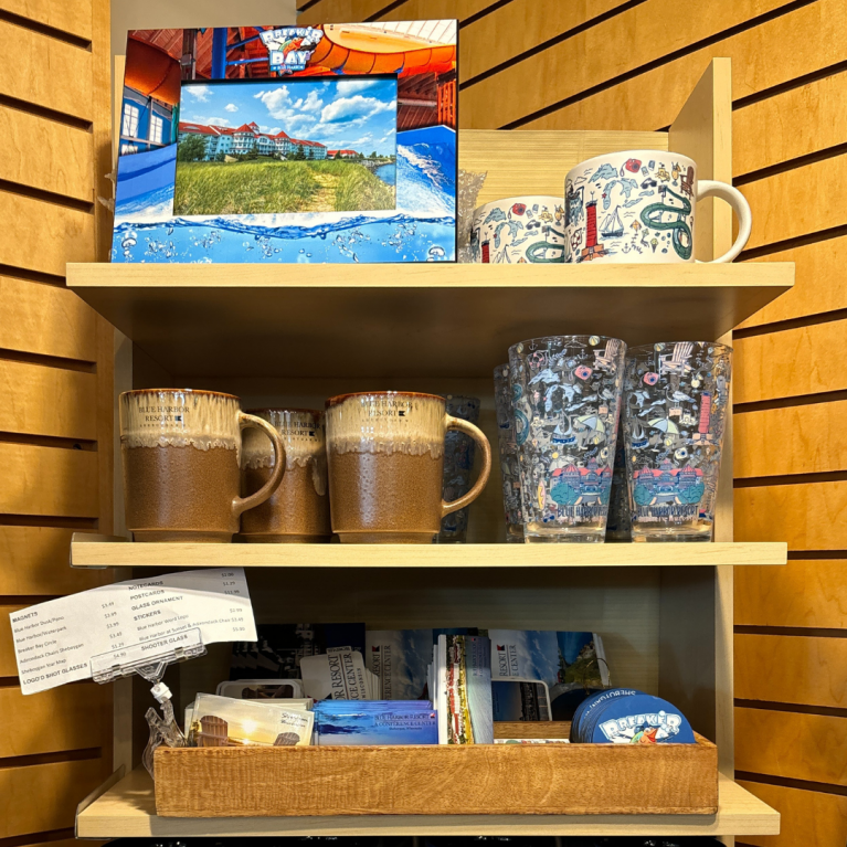 BLUE HARBOR RESORT SOUVENIR SHELF AT THE BOUTIQUE IN BLUE HARBOR RESORT