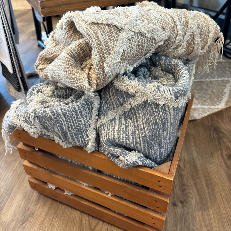 COZY BLANKETS AT THE BOUTIQUE IN BLUE HARBOR RESORT