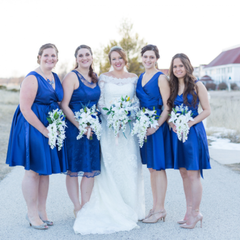 BRIDE AND BRIDESMAIDS OUTSIDE AT BLUE HARBOR RESORT WEDDING